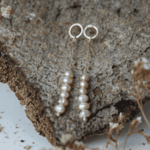 Oorhangers cirkel en hangende roze pareltjes