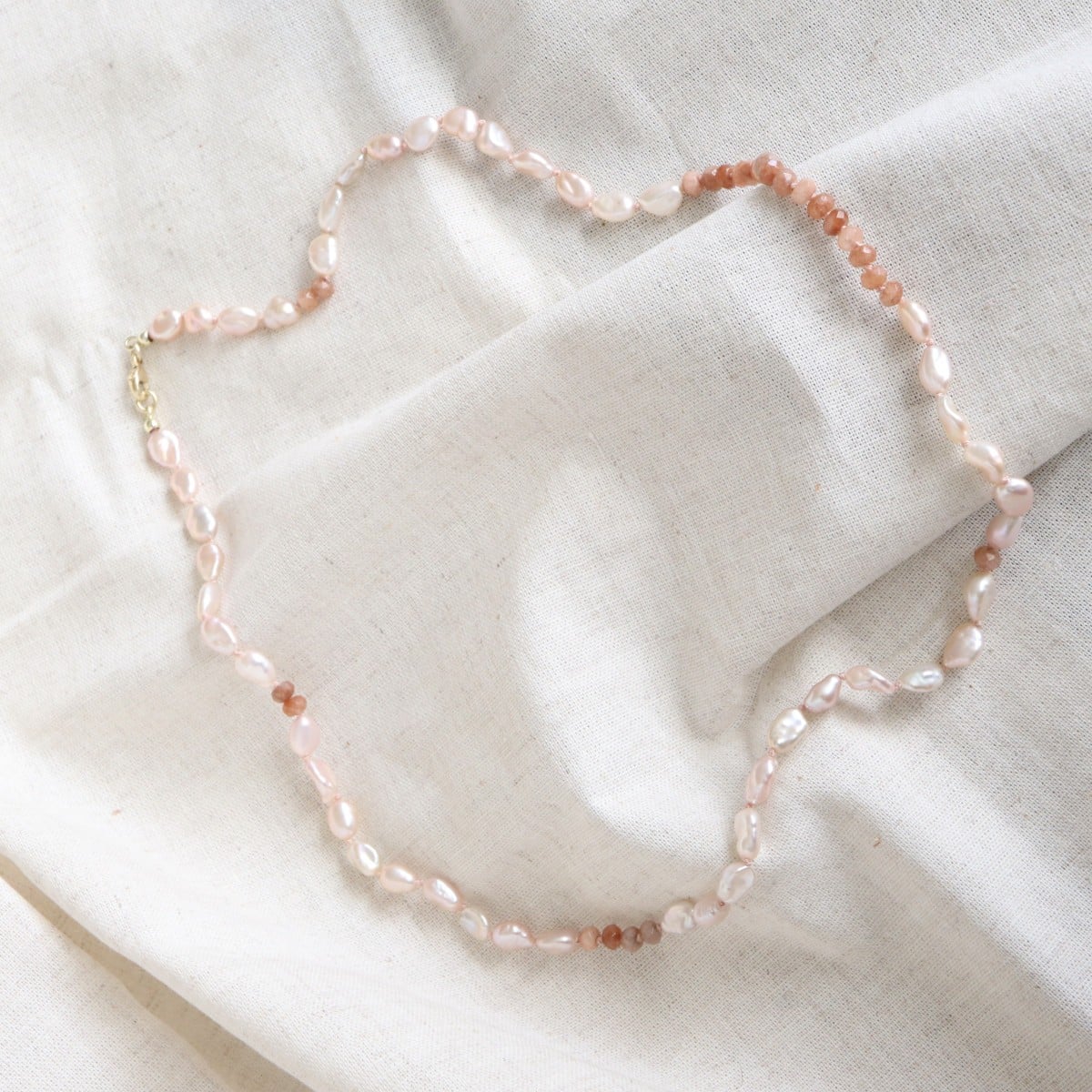 Collier keshi parels en roze jade