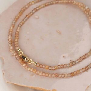 Zirkoon collier met goud